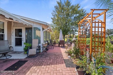 This 3-bedroom, 2-bath home in Sun City features a bright on Hidden Cypress Golf Club in South Carolina - for sale on GolfHomes.com, golf home, golf lot