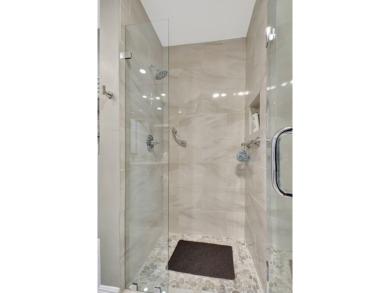 Step into luxury with this expanded first-floor Eastgate condo on Hunters Run Golf and Country Club in Florida - for sale on GolfHomes.com, golf home, golf lot