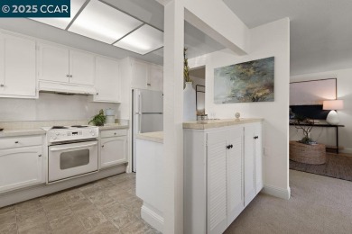 This bright and cheerful Sequoia Wrap end-unit is like a tree on Rossmoor Golf Course in California - for sale on GolfHomes.com, golf home, golf lot