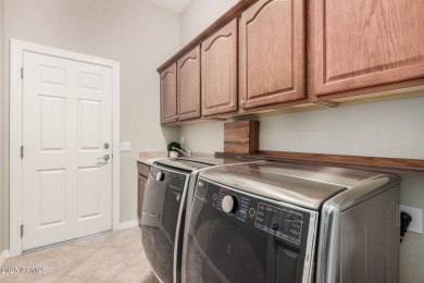 A beautiful 2 bed, 2.5 bath residence in Sun City Grand. Backing on Cimarron Golf Club in Arizona - for sale on GolfHomes.com, golf home, golf lot
