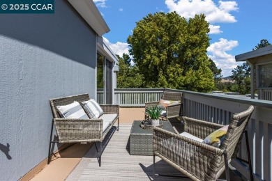 This bright and cheerful Sequoia Wrap end-unit is like a tree on Rossmoor Golf Course in California - for sale on GolfHomes.com, golf home, golf lot