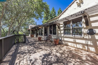 Immerse yourself in beauty! Perched on a 13,860 square foot lot on Orinda Country Club in California - for sale on GolfHomes.com, golf home, golf lot