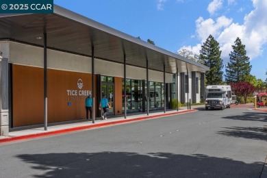 This bright and cheerful Sequoia Wrap end-unit is like a tree on Rossmoor Golf Course in California - for sale on GolfHomes.com, golf home, golf lot