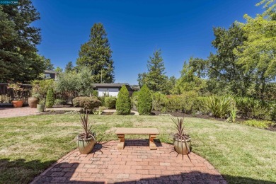 Immerse yourself in beauty! Perched on a 13,860 square foot lot on Orinda Country Club in California - for sale on GolfHomes.com, golf home, golf lot