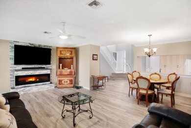 Step into paradise with this 2-bed, 2.5-bath townhouse nestled on Riverbend Golf Club in Florida - for sale on GolfHomes.com, golf home, golf lot