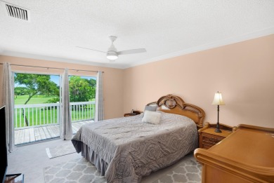 Step into paradise with this 2-bed, 2.5-bath townhouse nestled on Riverbend Golf Club in Florida - for sale on GolfHomes.com, golf home, golf lot