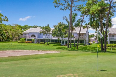 Step into paradise with this 2-bed, 2.5-bath townhouse nestled on Riverbend Golf Club in Florida - for sale on GolfHomes.com, golf home, golf lot