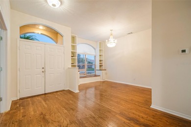 Spacious and well-maintained, this 5-bedroom, 3-bath POOL home on Remington Golf Club in Florida - for sale on GolfHomes.com, golf home, golf lot