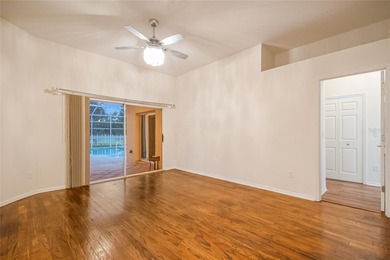 Spacious and well-maintained, this 5-bedroom, 3-bath POOL home on Remington Golf Club in Florida - for sale on GolfHomes.com, golf home, golf lot