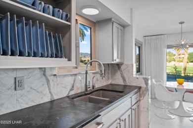 Welcome to 393 Hagen Way, a striking mid-century modern villa on London Bridge Golf Course in Arizona - for sale on GolfHomes.com, golf home, golf lot