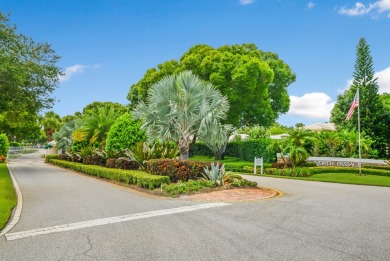 Step into paradise with this 2-bed, 2.5-bath townhouse nestled on Riverbend Golf Club in Florida - for sale on GolfHomes.com, golf home, golf lot