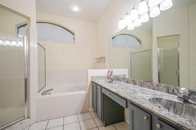 Spacious and well-maintained, this 5-bedroom, 3-bath POOL home on Remington Golf Club in Florida - for sale on GolfHomes.com, golf home, golf lot