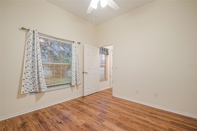 Spacious and well-maintained, this 5-bedroom, 3-bath POOL home on Remington Golf Club in Florida - for sale on GolfHomes.com, golf home, golf lot