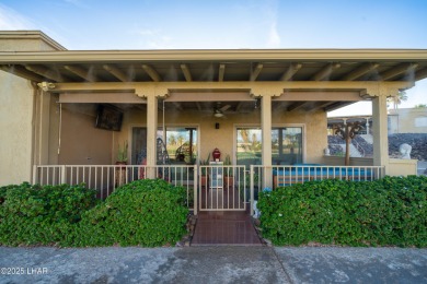 Welcome to 393 Hagen Way, a striking mid-century modern villa on London Bridge Golf Course in Arizona - for sale on GolfHomes.com, golf home, golf lot