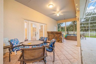 Spacious and well-maintained, this 5-bedroom, 3-bath POOL home on Remington Golf Club in Florida - for sale on GolfHomes.com, golf home, golf lot