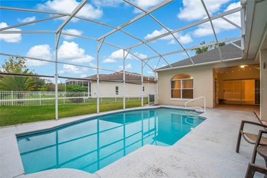 Spacious and well-maintained, this 5-bedroom, 3-bath POOL home on Remington Golf Club in Florida - for sale on GolfHomes.com, golf home, golf lot