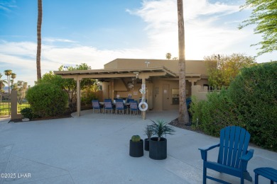 Welcome to 393 Hagen Way, a gorgeous, furnished villa perfectly on London Bridge Golf Course in Arizona - for sale on GolfHomes.com, golf home, golf lot