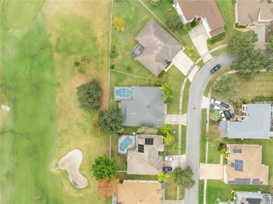 Spacious and well-maintained, this 5-bedroom, 3-bath POOL home on Remington Golf Club in Florida - for sale on GolfHomes.com, golf home, golf lot