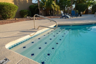 Welcome to 393 Hagen Way, a gorgeous, furnished villa perfectly on London Bridge Golf Course in Arizona - for sale on GolfHomes.com, golf home, golf lot