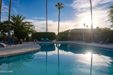 Welcome to 393 Hagen Way, a gorgeous, furnished villa perfectly on London Bridge Golf Course in Arizona - for sale on GolfHomes.com, golf home, golf lot