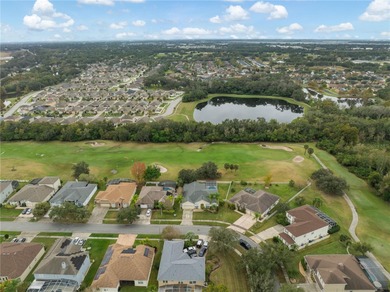 Spacious and well-maintained, this 5-bedroom, 3-bath POOL home on Remington Golf Club in Florida - for sale on GolfHomes.com, golf home, golf lot