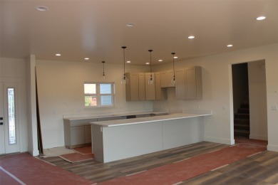 BUYERS CREDIT IF USED TOWARDS AN INTEREST BUY DOWN COULD SAVE on Polson Bay Golf Course - Championship Course in Montana - for sale on GolfHomes.com, golf home, golf lot