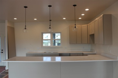 BUYERS CREDIT IF USED TOWARDS AN INTEREST BUY DOWN COULD SAVE on Polson Bay Golf Course - Championship Course in Montana - for sale on GolfHomes.com, golf home, golf lot