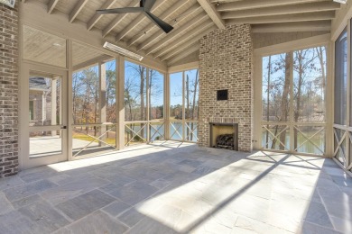 Nestled behind the gates of Reynolds, this stunning new custom on Reynolds Lake Oconee - The Oconee in Georgia - for sale on GolfHomes.com, golf home, golf lot