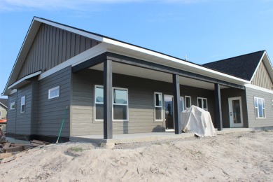 BUYERS CREDIT IF USED TOWARDS AN INTEREST BUY DOWN COULD SAVE on Polson Bay Golf Course - Championship Course in Montana - for sale on GolfHomes.com, golf home, golf lot