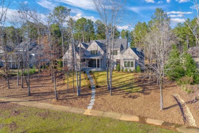 Nestled behind the gates of Reynolds, this stunning new custom on Reynolds Lake Oconee - The Oconee in Georgia - for sale on GolfHomes.com, golf home, golf lot