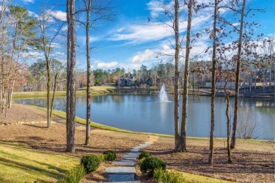 Nestled behind the gates of Reynolds, this stunning new custom on Reynolds Lake Oconee - The Oconee in Georgia - for sale on GolfHomes.com, golf home, golf lot