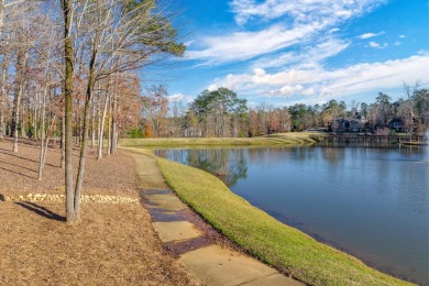 Nestled behind the gates of Reynolds, this stunning new custom on Reynolds Lake Oconee - The Oconee in Georgia - for sale on GolfHomes.com, golf home, golf lot