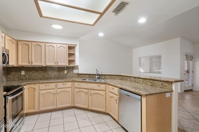 Welcome home to this beautifully updated 2-bedroom, 2-bath home on Fountain of the Sun Country Club in Arizona - for sale on GolfHomes.com, golf home, golf lot