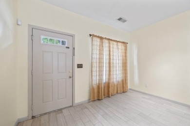 Charming  2-story townhome located in Little Suwanee Pointe on Collins Hill Golf Club in Georgia - for sale on GolfHomes.com, golf home, golf lot