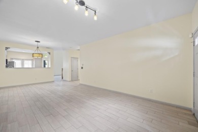 Charming  2-story townhome located in Little Suwanee Pointe on Collins Hill Golf Club in Georgia - for sale on GolfHomes.com, golf home, golf lot