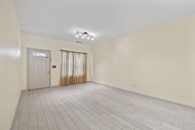 Charming  2-story townhome located in Little Suwanee Pointe on Collins Hill Golf Club in Georgia - for sale on GolfHomes.com, golf home, golf lot
