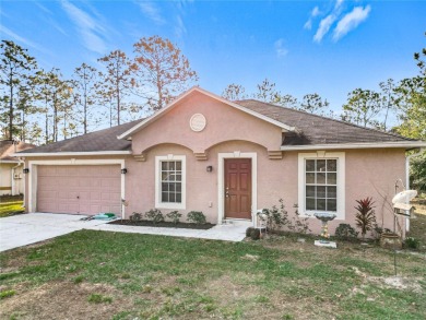 Welcome to this charming 3 bedroom, 2 bath, 2 car garage home on Citrus Springs Country Club in Florida - for sale on GolfHomes.com, golf home, golf lot