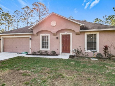 Welcome to this charming 3 bedroom, 2 bath, 2 car garage home on Citrus Springs Country Club in Florida - for sale on GolfHomes.com, golf home, golf lot