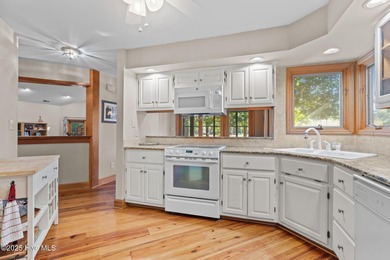 Unique architecture highlights this irresistible one-level home on Brandywine Bay Golf Club in North Carolina - for sale on GolfHomes.com, golf home, golf lot