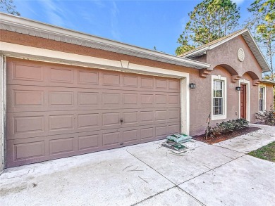 Welcome to this charming 3 bedroom, 2 bath, 2 car garage home on Citrus Springs Country Club in Florida - for sale on GolfHomes.com, golf home, golf lot