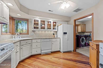 Unique architecture highlights this irresistible one-level home on Brandywine Bay Golf Club in North Carolina - for sale on GolfHomes.com, golf home, golf lot