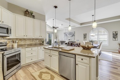 WARM, WELCOMING AND BEAUTIFULLY UPDATED THROUGHOUT! Meticulous on The Legacy Golf and Tennis Club in Florida - for sale on GolfHomes.com, golf home, golf lot