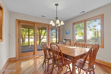 Unique architecture highlights this irresistible one-level home on Brandywine Bay Golf Club in North Carolina - for sale on GolfHomes.com, golf home, golf lot