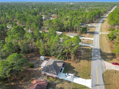 Welcome to this charming 3 bedroom, 2 bath, 2 car garage home on Citrus Springs Country Club in Florida - for sale on GolfHomes.com, golf home, golf lot