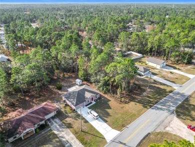 Welcome to this charming 3 bedroom, 2 bath, 2 car garage home on Citrus Springs Country Club in Florida - for sale on GolfHomes.com, golf home, golf lot
