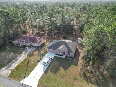 Welcome to this charming 3 bedroom, 2 bath, 2 car garage home on Citrus Springs Country Club in Florida - for sale on GolfHomes.com, golf home, golf lot