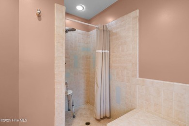 Unique architecture highlights this irresistible one-level home on Brandywine Bay Golf Club in North Carolina - for sale on GolfHomes.com, golf home, golf lot