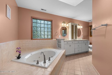 Unique architecture highlights this irresistible one-level home on Brandywine Bay Golf Club in North Carolina - for sale on GolfHomes.com, golf home, golf lot