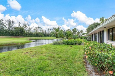 Shimmering lake and golf course views from this luxurious 3 on Quail Ridge Golf Course and Country Club in Florida - for sale on GolfHomes.com, golf home, golf lot