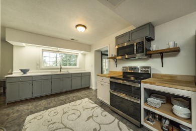 Tucked into a serene, park-like setting, this beautifully on  in Arkansas - for sale on GolfHomes.com, golf home, golf lot
